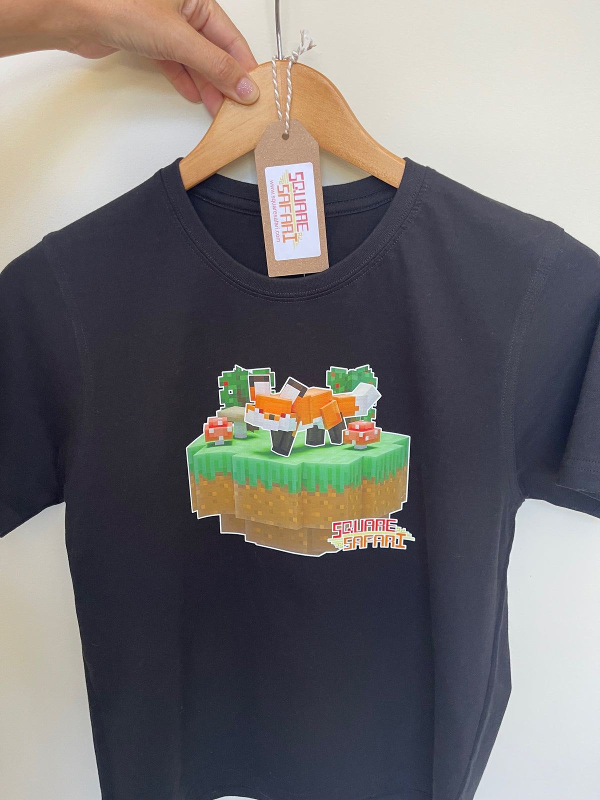 Hand-crafted pixel art red fox design on a kids t-shirt — original square-style wildlife art for gamers, animal lovers and collectors. Square Safari