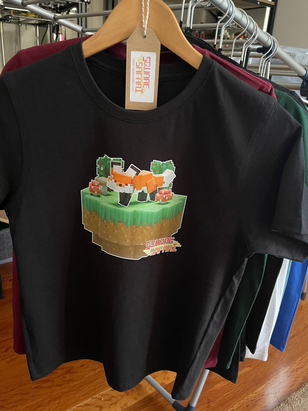 Hand-crafted pixel art red fox design on a kids t-shirt — original square-style wildlife art for gamers, animal lovers and collectors. Square Safari