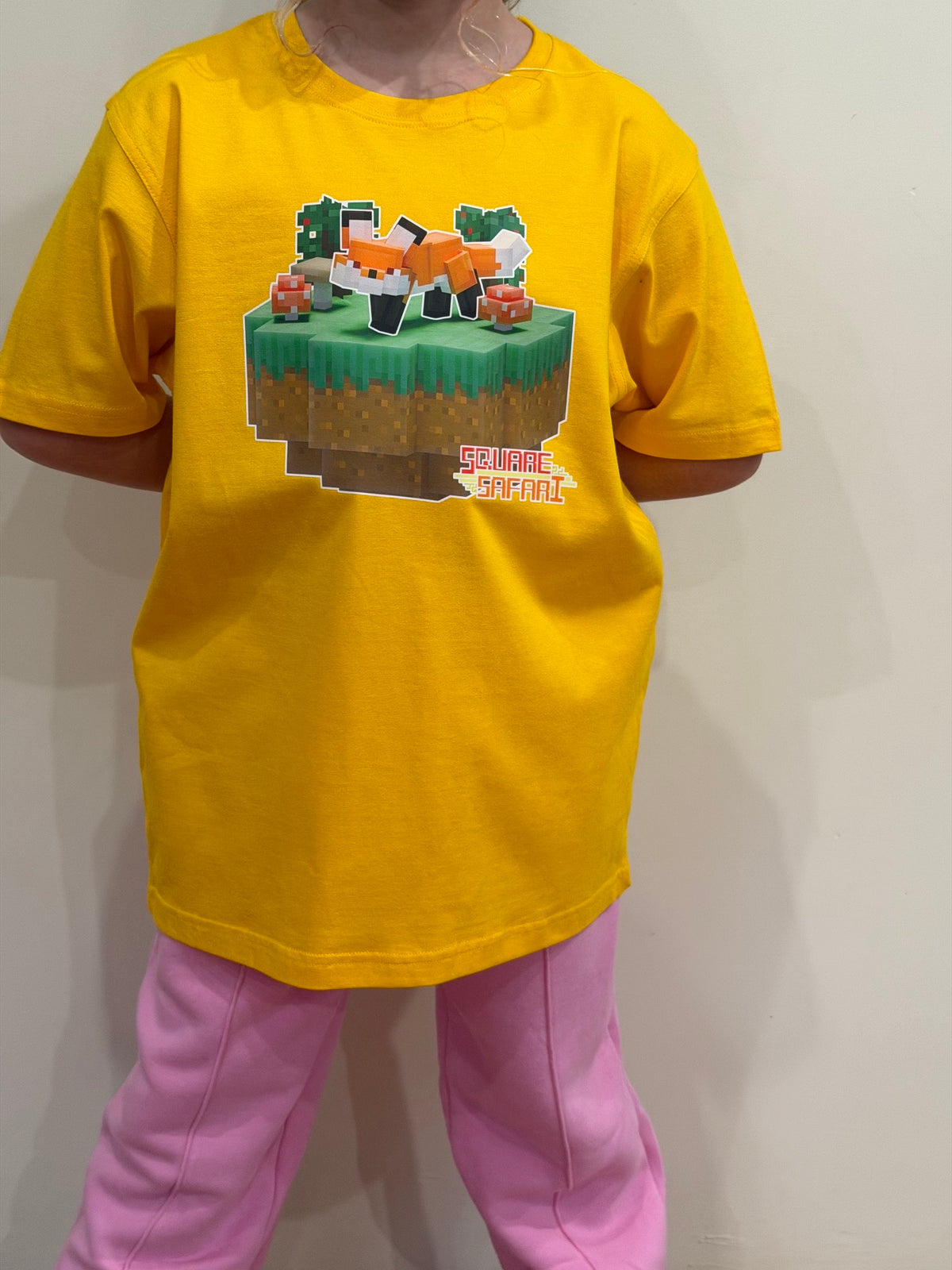 Hand-crafted pixel art red fox design on a kids t-shirt — original square-style wildlife art for gamers, animal lovers and collectors. Square Safari handmade low poli pixel art design  shirt with worldwide shipping