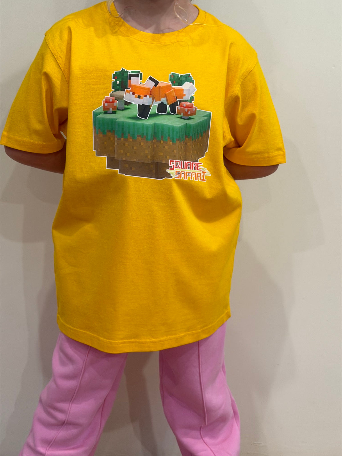 Hand-crafted pixel art red fox design on a kids t-shirt — original square-style wildlife art for gamers, animal lovers and collectors. Square Safari handmade low poli pixel art design  shirt with worldwide shipping