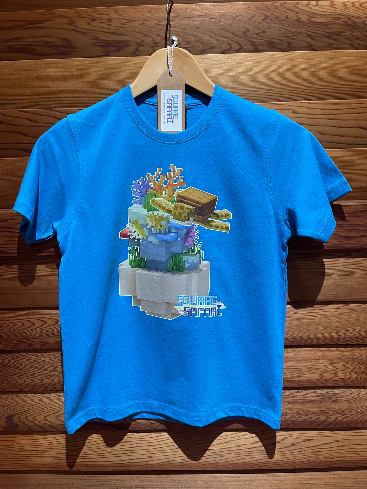 Sea Turtle Gliding Through the Ocean On Sale — Square Safari Kids T-Shirt