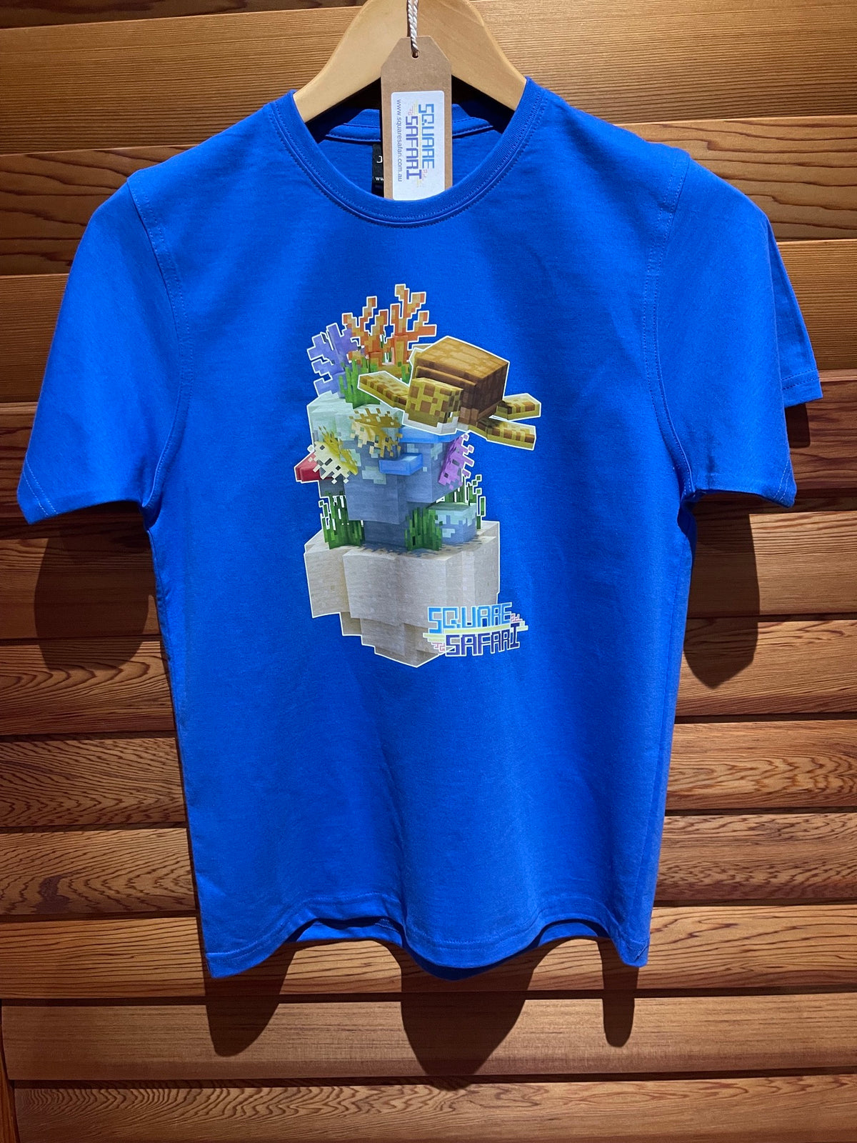 Sea Turtle Gliding Through the Ocean On Sale — Square Safari Kids T-Shirt