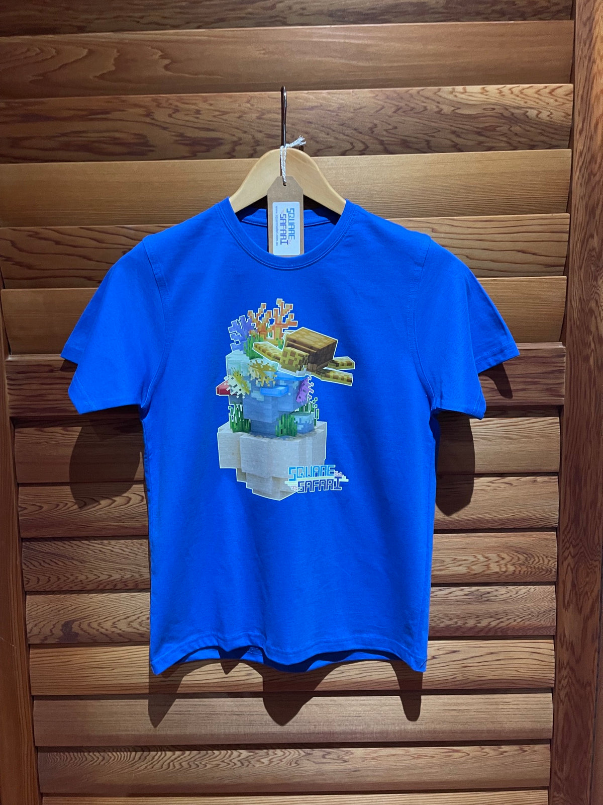 Sea Turtle Gliding Through the Ocean On Sale — Square Safari Kids T-Shirt
