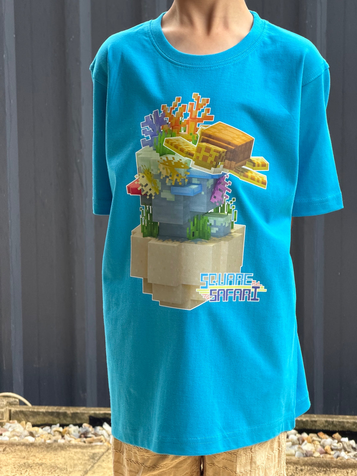 Sea Turtle Gliding Through the Ocean On Sale — Square Safari Kids T-Shirt