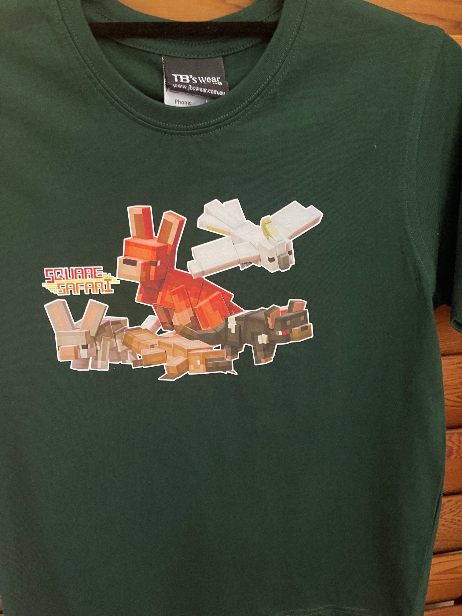 Aussie Animals pixel art kids t-shirt with Square Safari logo. australian animal art, wear the wild, kids aussie t shirt design, wildlife design t shirt