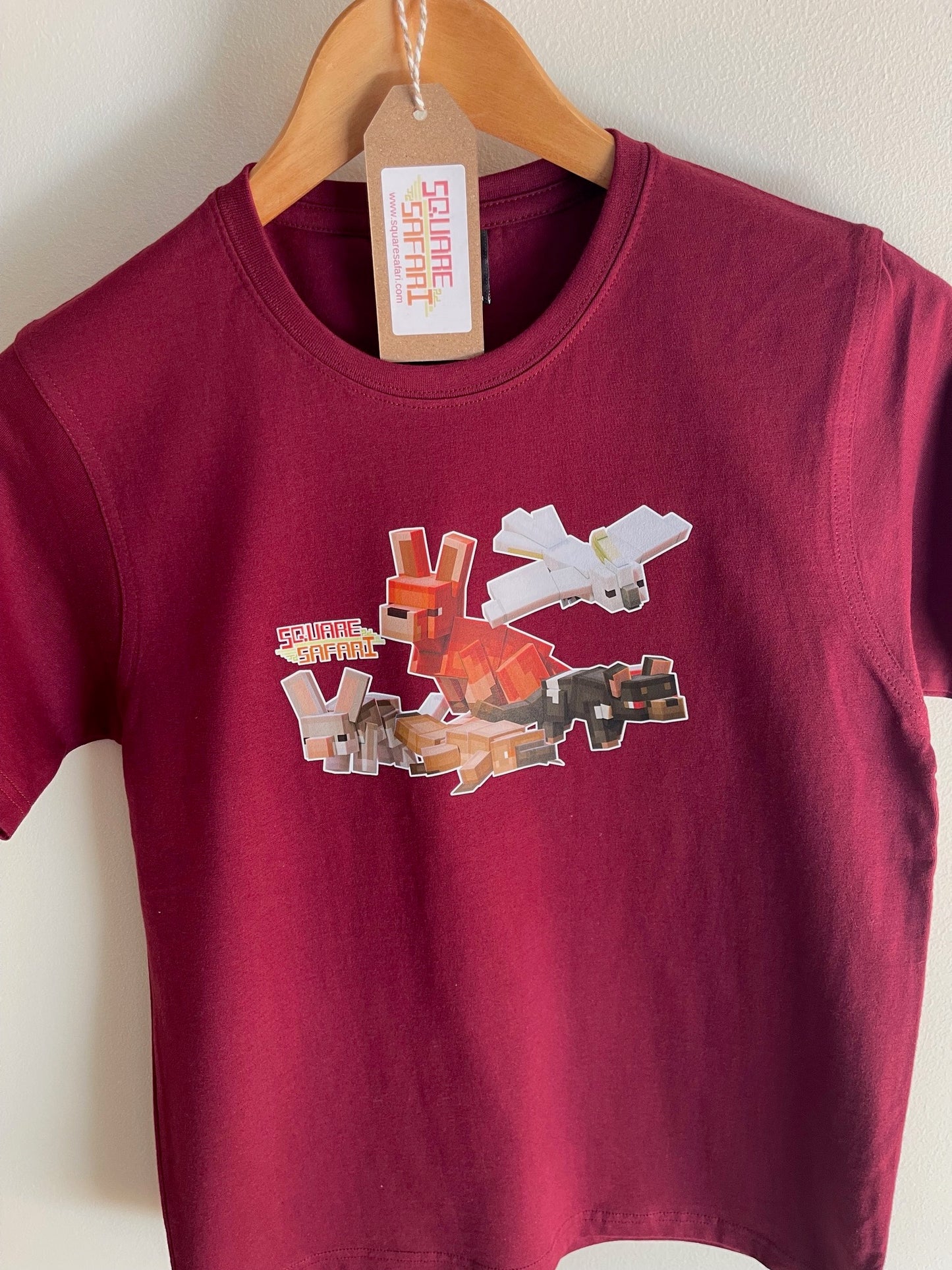 Aussie Animals pixel art kids t-shirt with Square Safari logo. australian animal art, wear the wild, kids aussie t shirt design, wildlife design t shirt