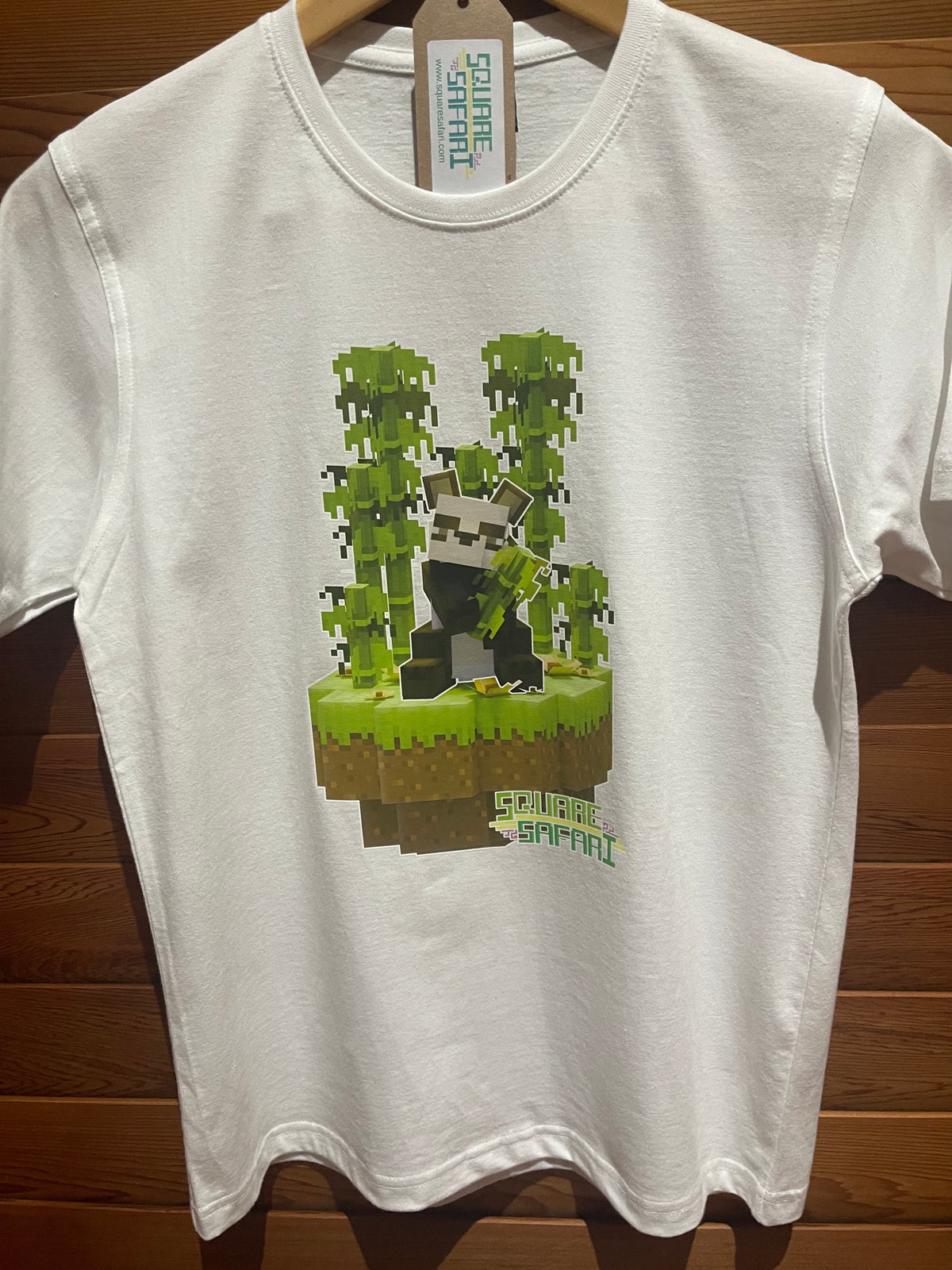Pixel art Giant Panda kids t-shirt in green — Square Safari original wildlife design, sizes 2–14. various colours including black, white, navy, grey kids t shirt with original artwork pixel design panda handmade in australia with worldwide shipping, gift for pixel and block style art lover perfect kids gift, animal lover gift idea
