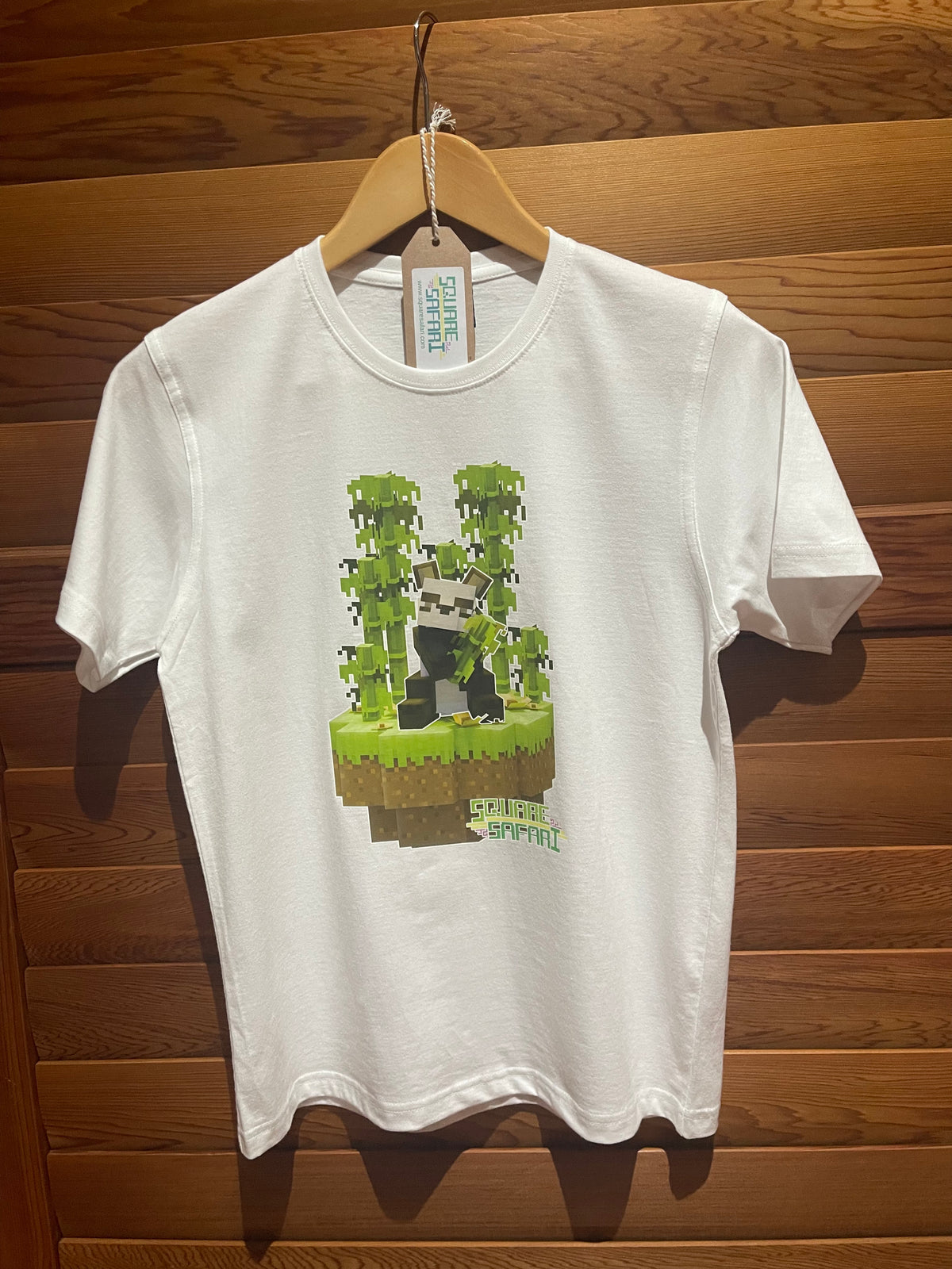 Pixel art Giant Panda kids t-shirt in green — Square Safari original wildlife design, sizes 2–14. various colours including black, white, navy, grey kids t shirt with original artwork pixel design panda handmade in australia with worldwide shipping, gift for pixel and block style art lover perfect kids gift, animal lover gift idea