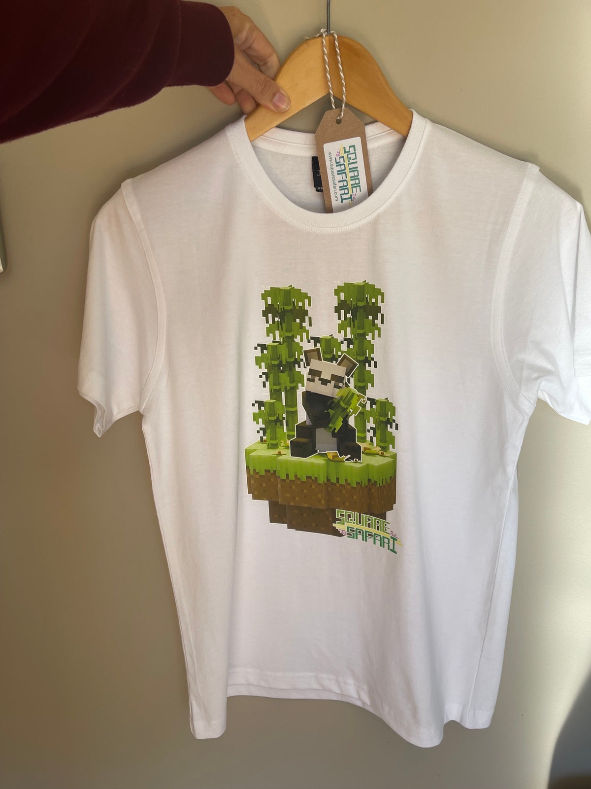 Pixel art Giant Panda kids t-shirt in green — Square Safari original wildlife design, sizes 2–14. various colours including black, white, navy, grey kids t shirt with original artwork pixel design panda handmade in australia with worldwide shipping, gift for pixel and block style art lover perfect kids gift, animal lover gift idea