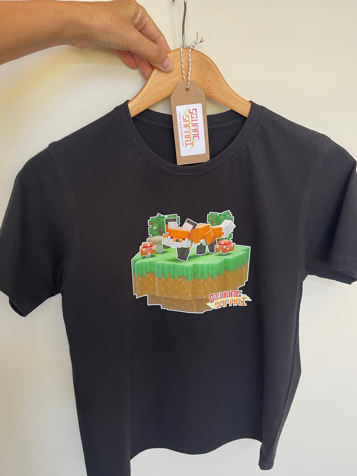 Hand-crafted pixel art red fox design on a kids t-shirt — original square-style wildlife art for gamers, animal lovers and collectors. Square Safari